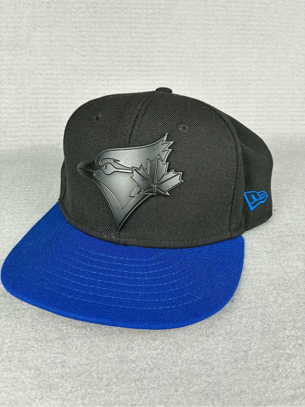New Era 7 1/8 Metal Logo Black and Blue Toronto Blue Jays Hat
